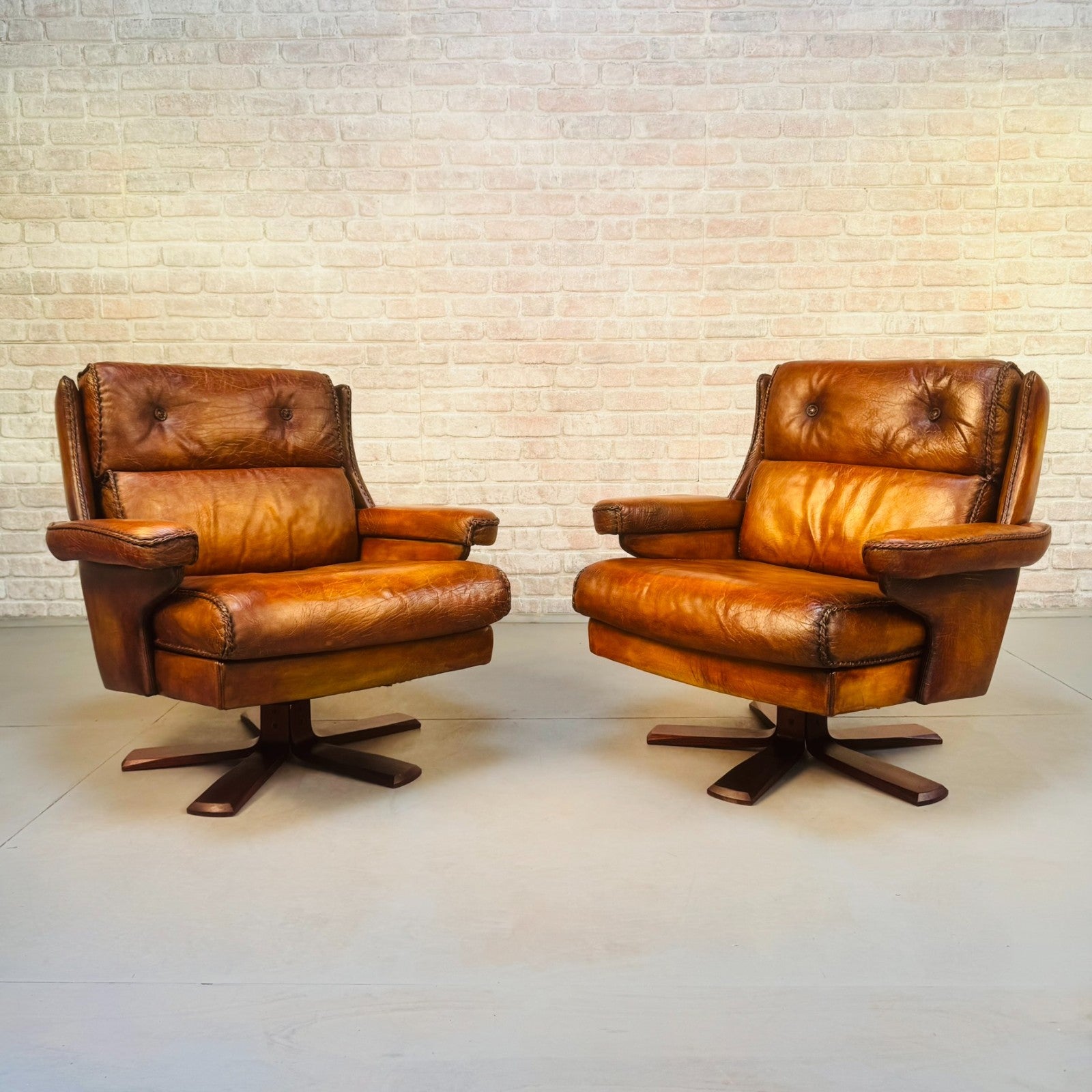 Pair Danish Swivel Chairs Tan Bison Leather Hand Plaited Lounge Chairs