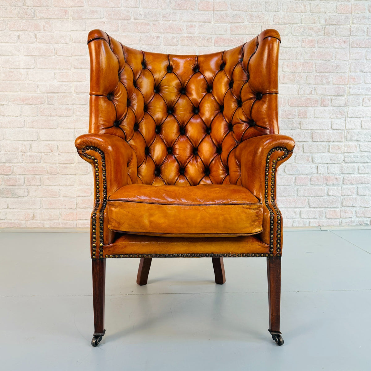 Vintage English Barrel Back Hand Dyed Tan Leather Wingback Armchair