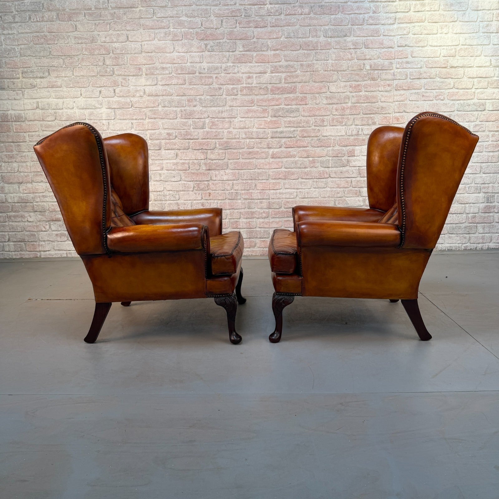 Pair of Vintage English Chesterfield Tan Hand-Dyed Leather Wingback Armchairs