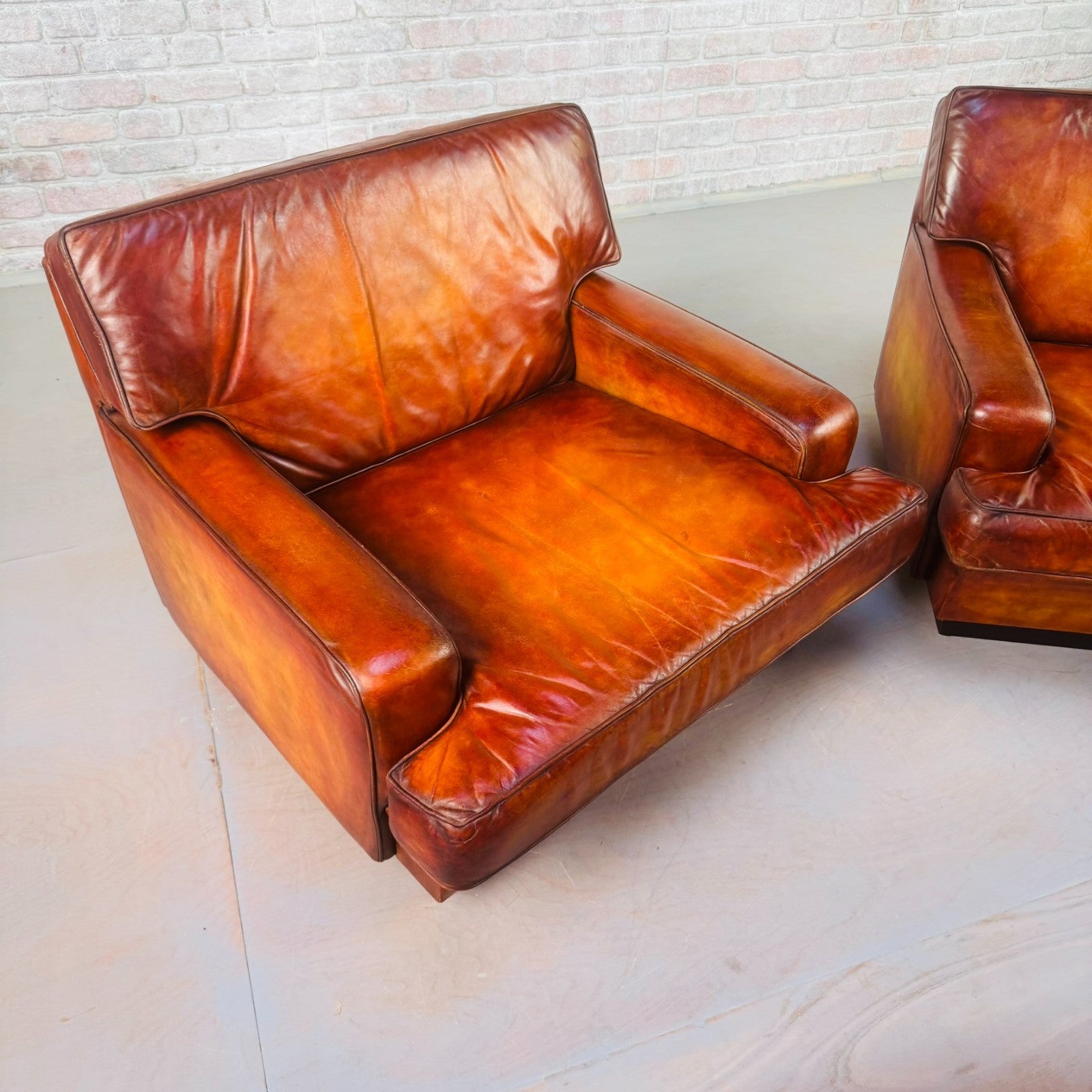 Pair of Arne Norell Swedish Tan Leather Lounge Chairs