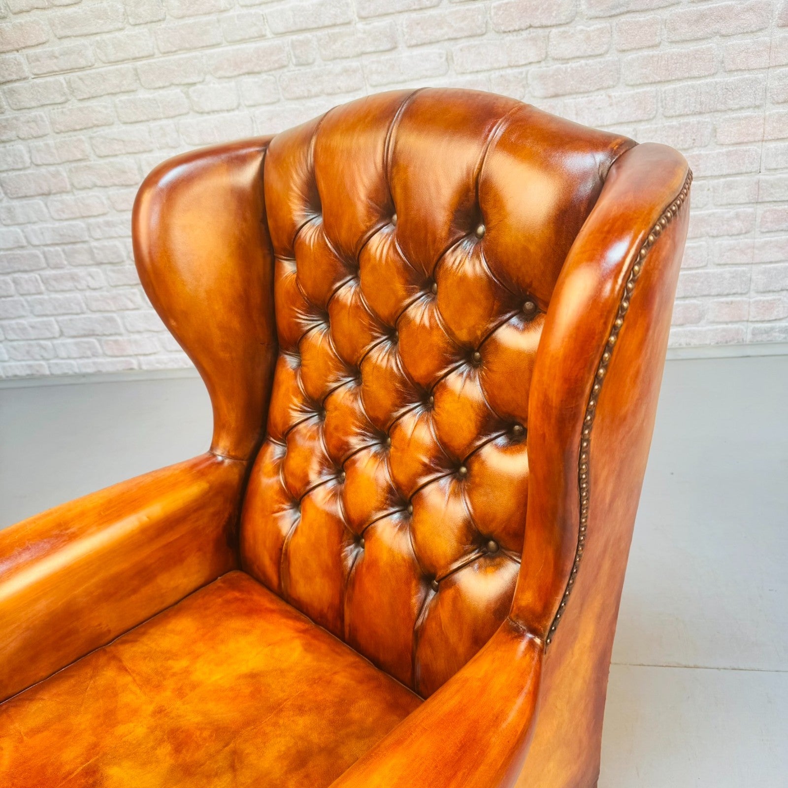 Vintage Pair of Danish Tan Leather Wingback Chairs