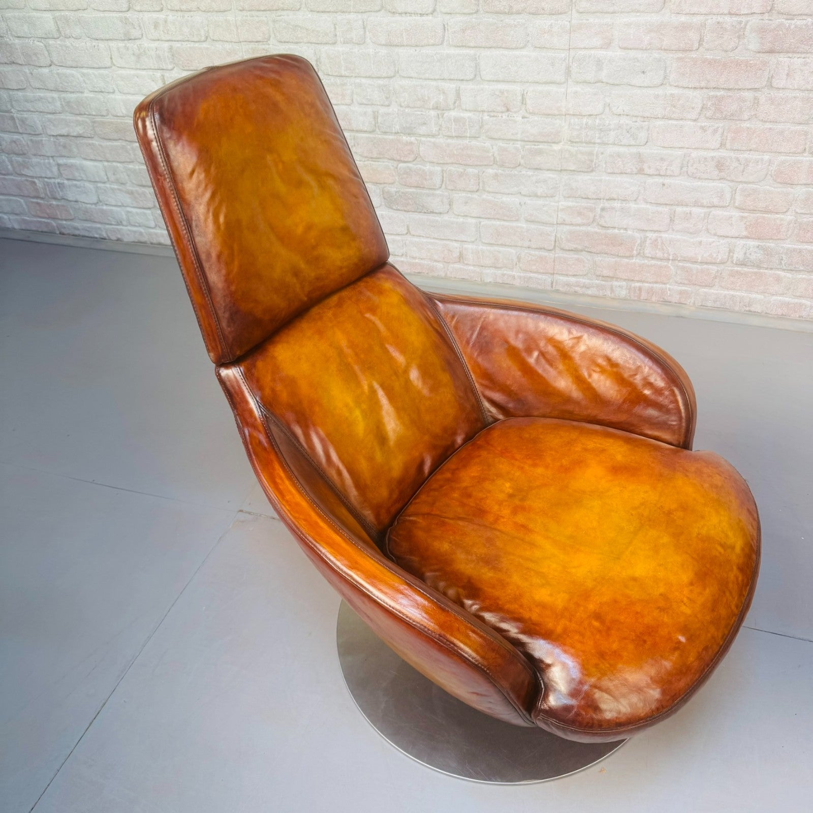 Pair of Vintage Italian Swivel Tan Leather Chairs