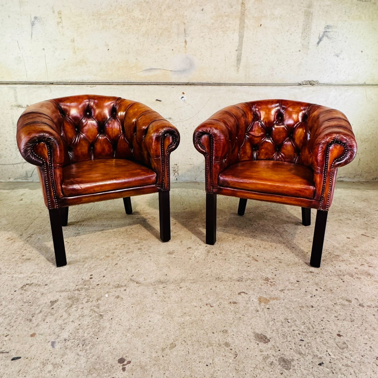 Pair of Elegant English Made Vintage Chesterfield Tan Leather Tub Chairs
