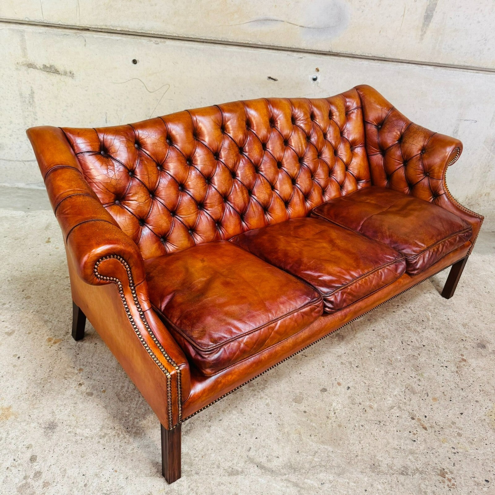 Mid-Century English Gainsborough Cognac Leather Chesterfield Three-Seater Sofa
