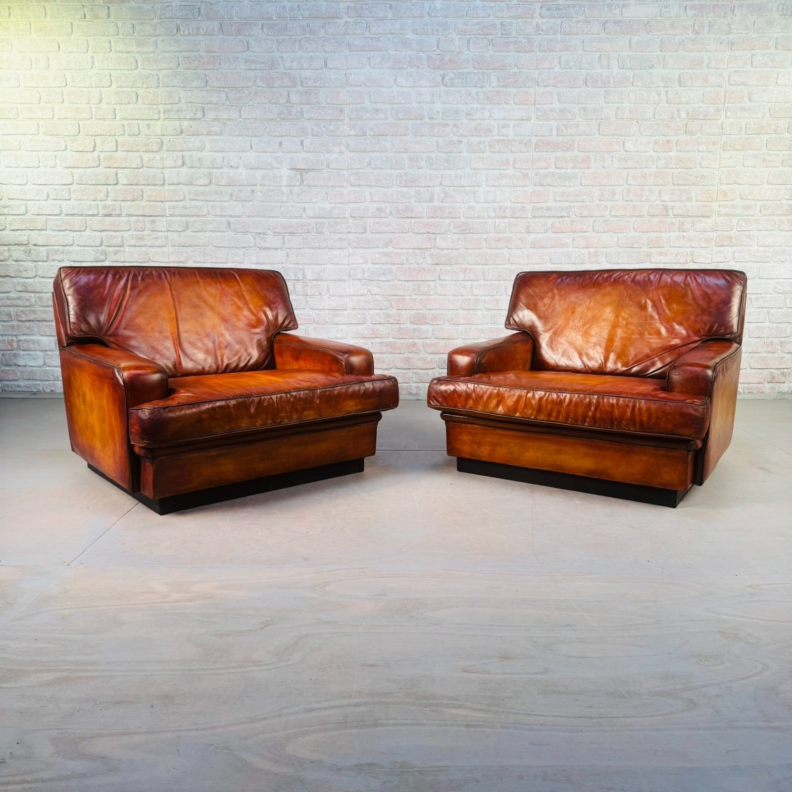 Pair of Arne Norell Swedish Tan Leather Lounge Chairs