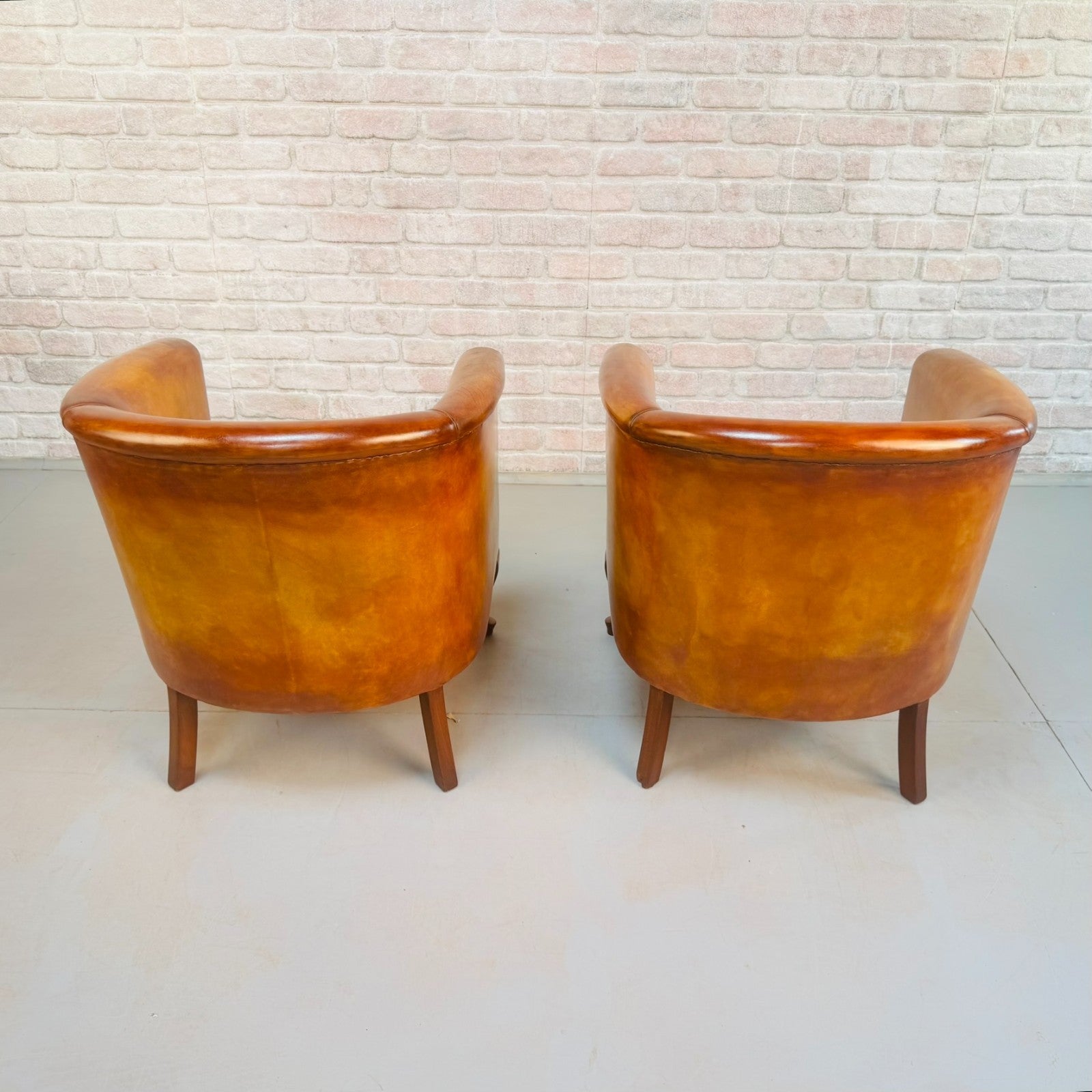 Vintage Pair of Danish Light Tan Leather Tub Chairs