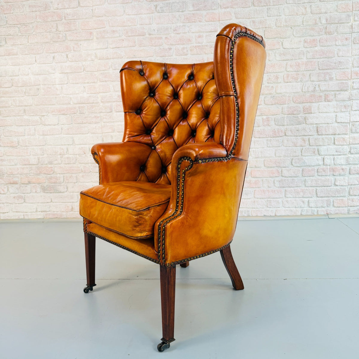 Vintage English Barrel Back Hand Dyed Tan Leather Wingback Armchair