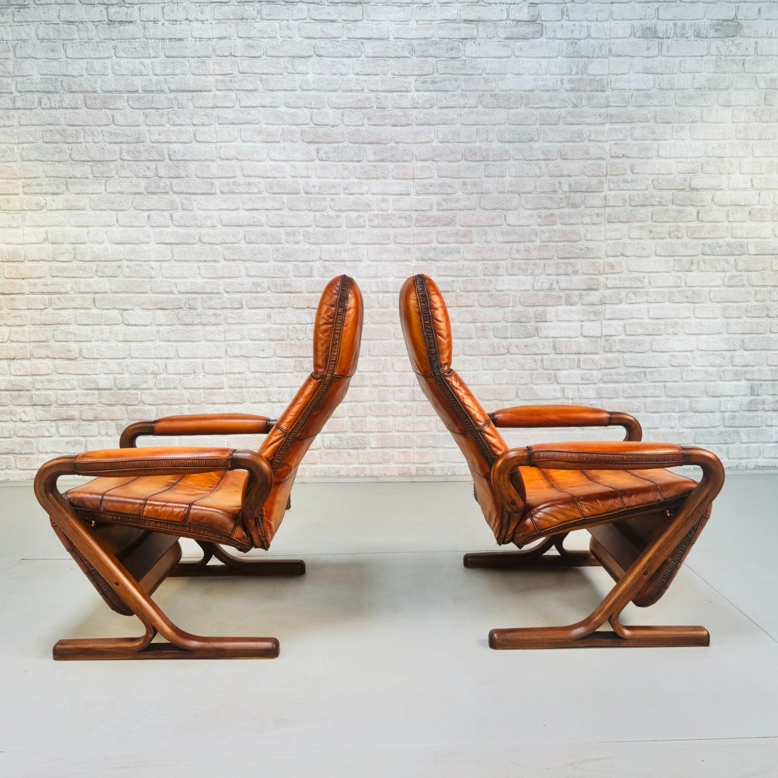 Pair of Vintage Danish Zero Gravity Reclining Tan Leather Armchairs Teak Frame
