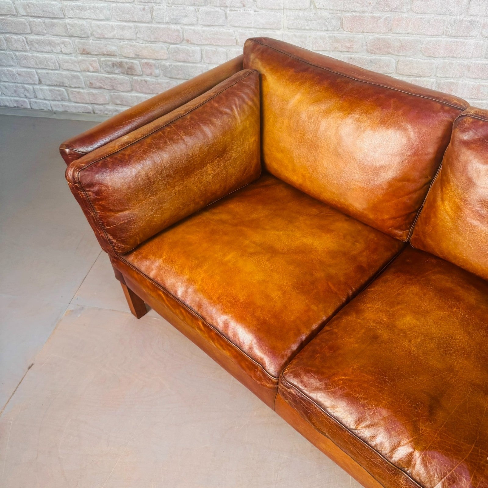 Vintage Stouby Tan Two-Seater Sofa Danish Buffalo Leather Feather Cushions