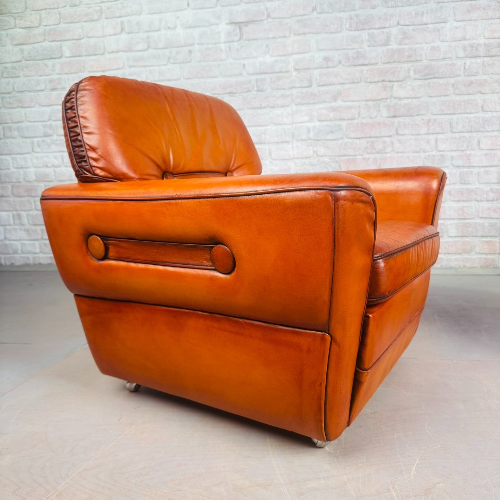 Pair of Elegant Danish Tan Leather Lounge Chairs