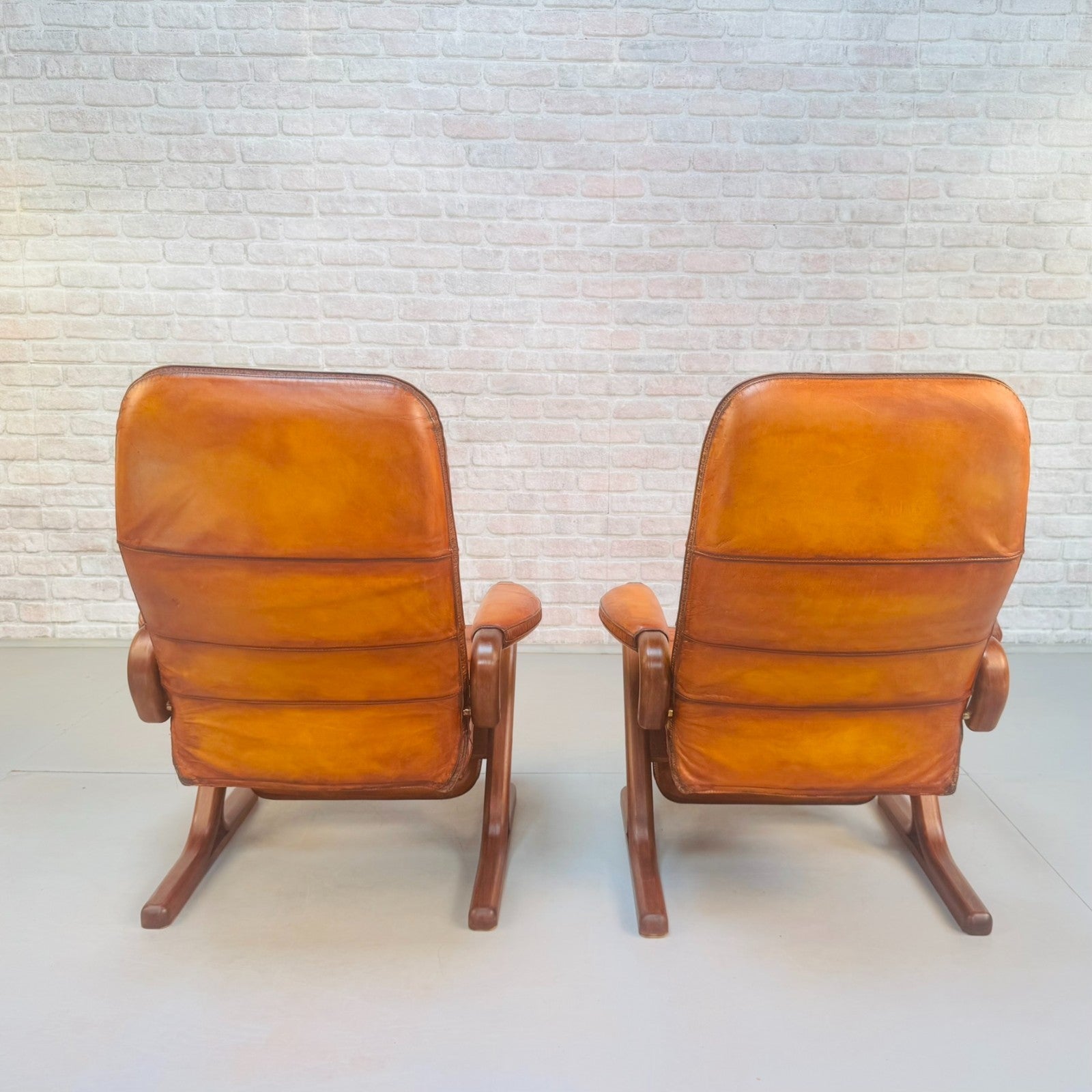 Pair of Vintage Danish Zero Gravity Reclining Tan Leather Armchairs Teak Frame