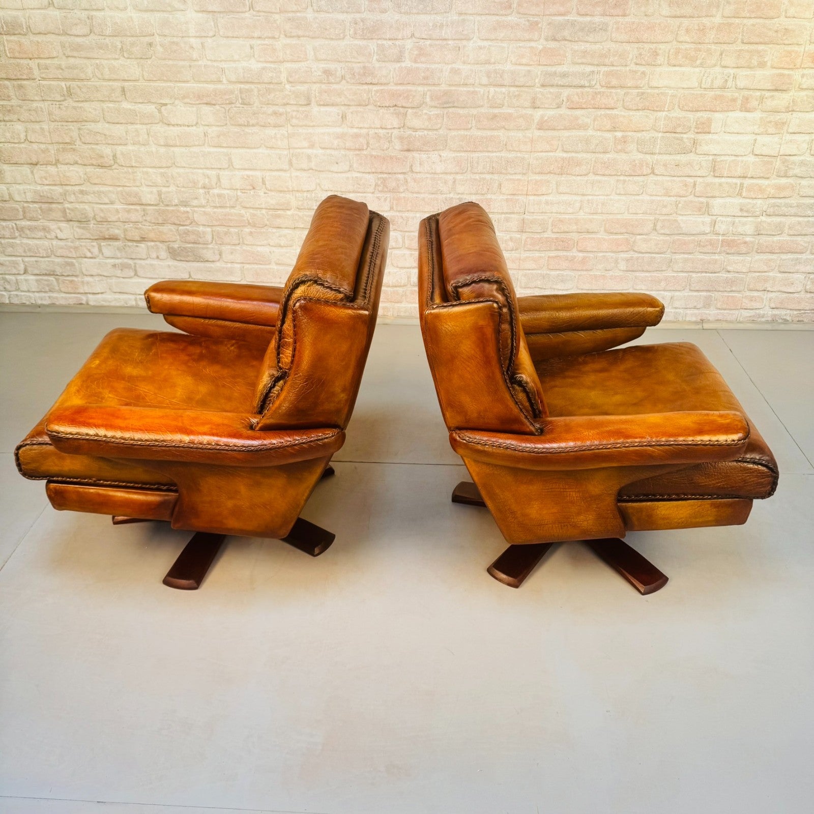 Pair Danish Swivel Chairs Tan Bison Leather Hand Plaited Lounge Chairs
