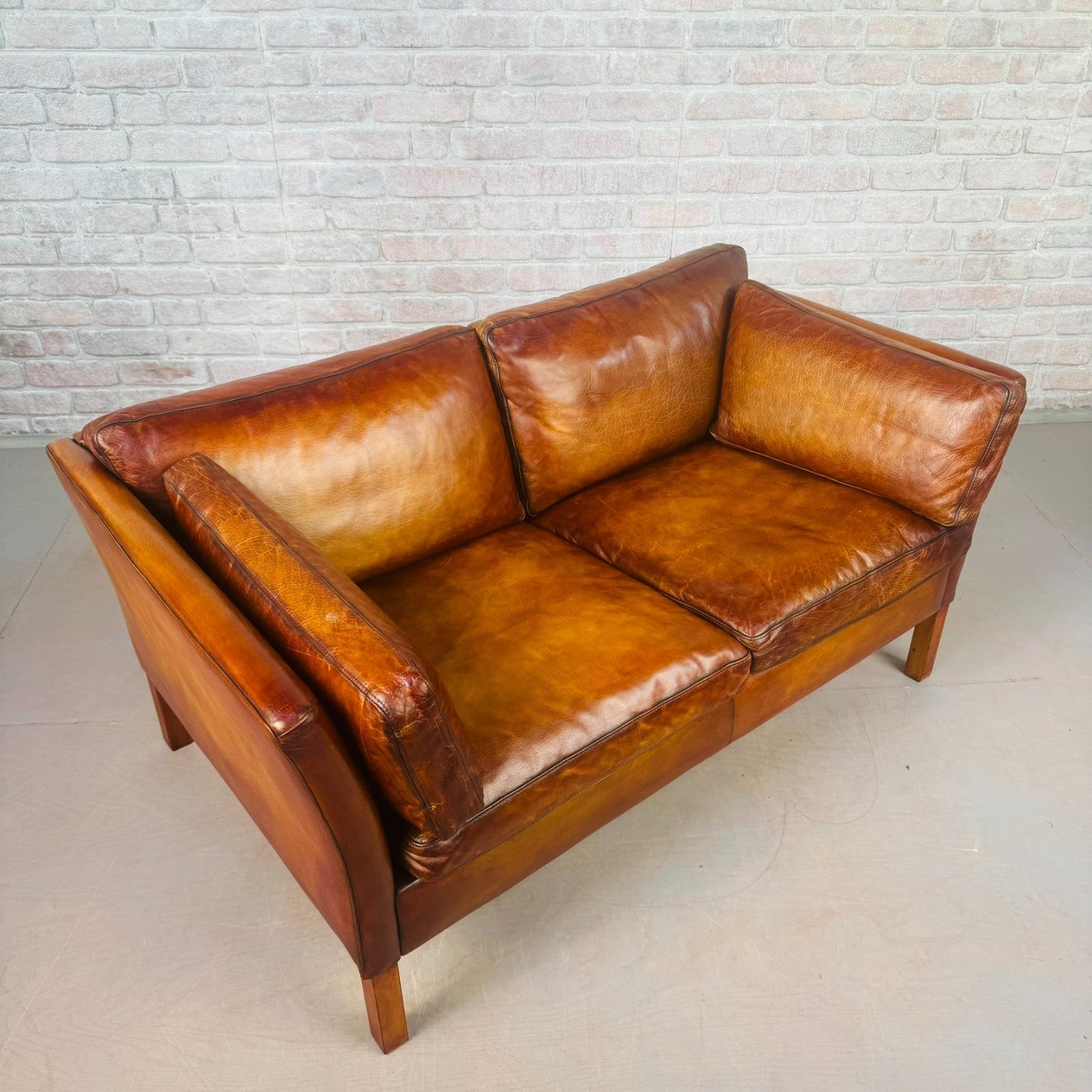Vintage Stouby Tan Two-Seater Sofa Danish Buffalo Leather Feather Cushions