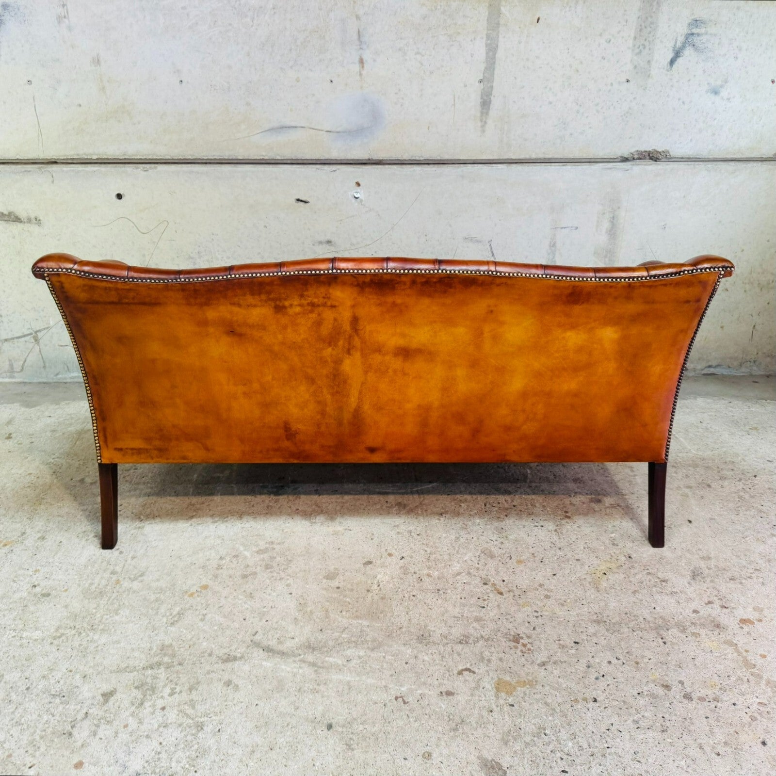 Mid-Century English Gainsborough Cognac Leather Chesterfield Three-Seater Sofa