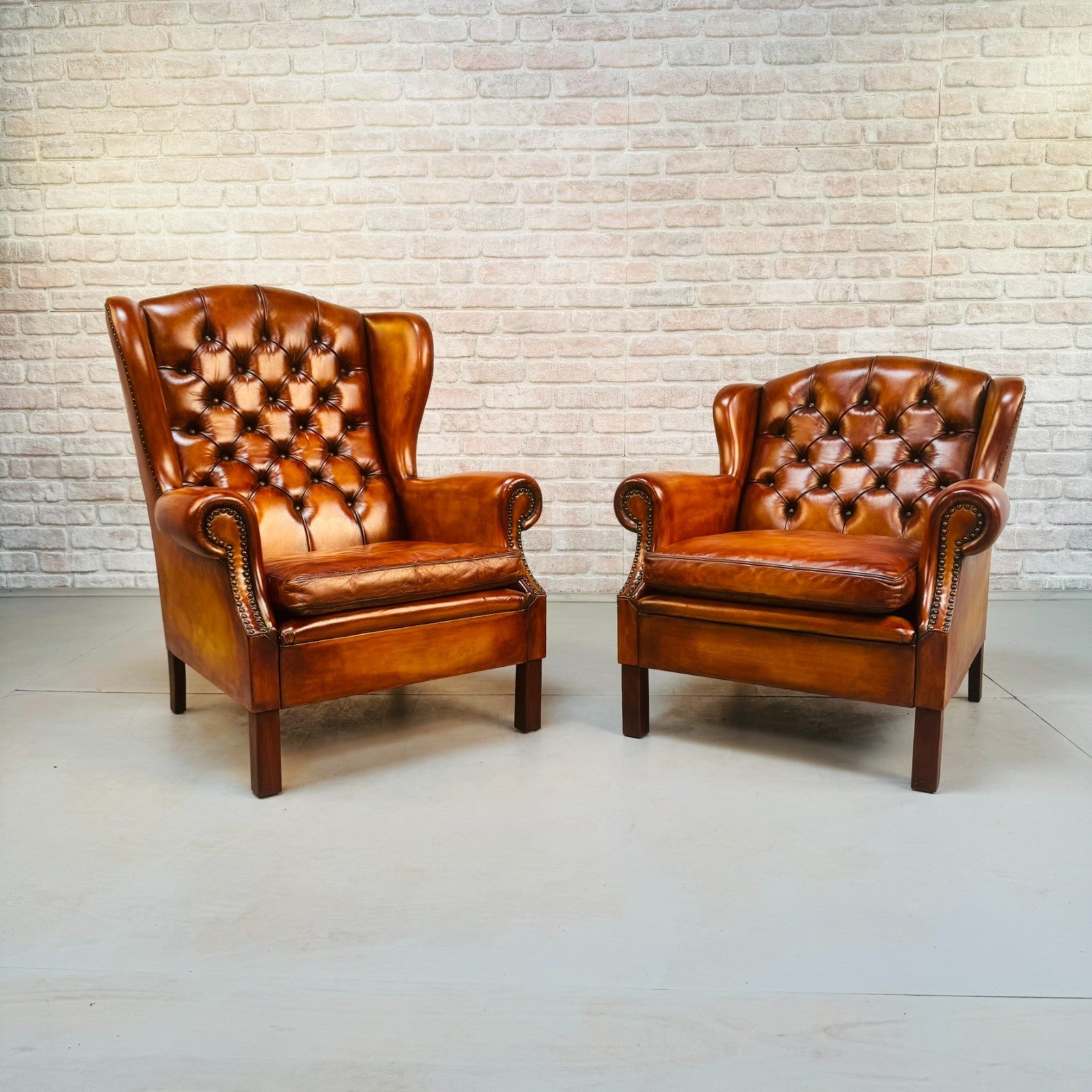 Vintage Pair of Danish Tan Leather Wingback Chairs
