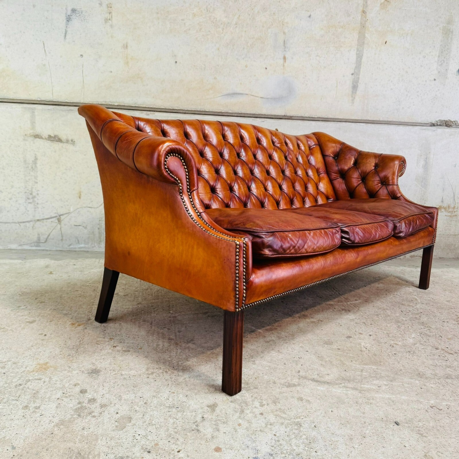 Mid-Century English Gainsborough Cognac Leather Chesterfield Three-Seater Sofa