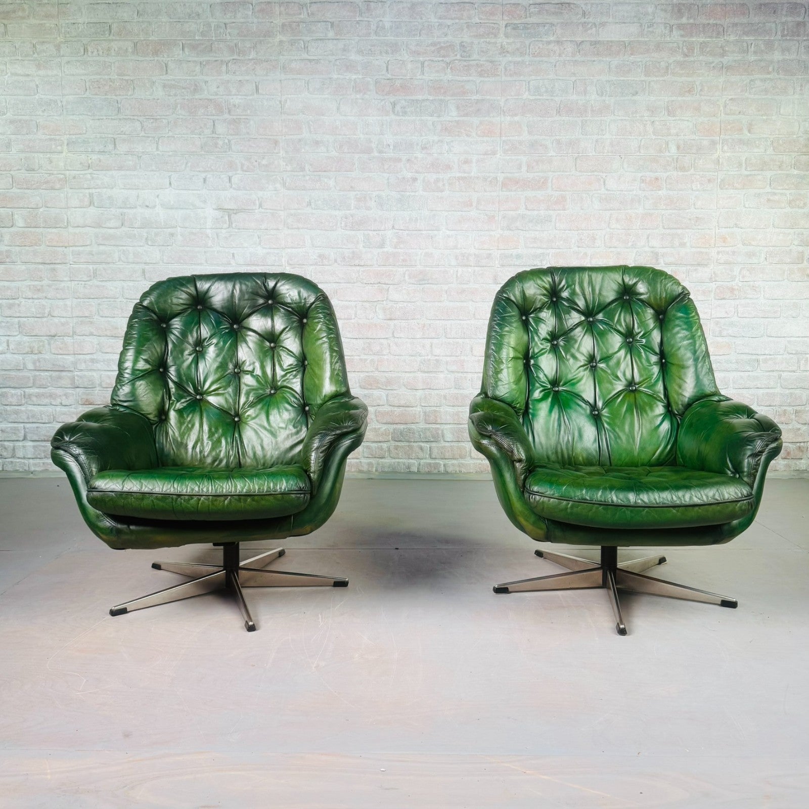 Pair of Vintage Danish Green Leather Swivel Chairs