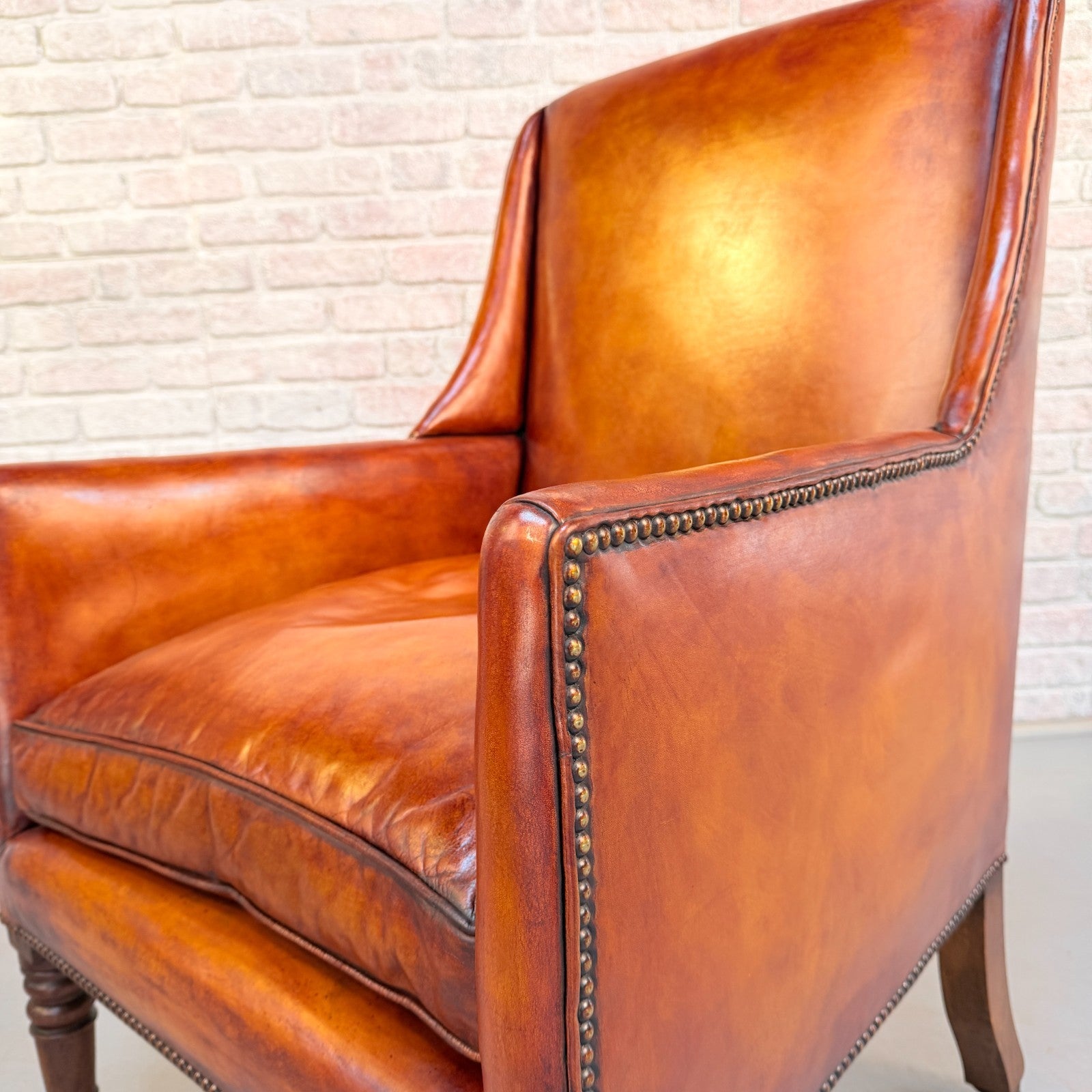 Circa 1910 Antique Tan Leather Armchair Hand Dyed Feather Cushions Castors