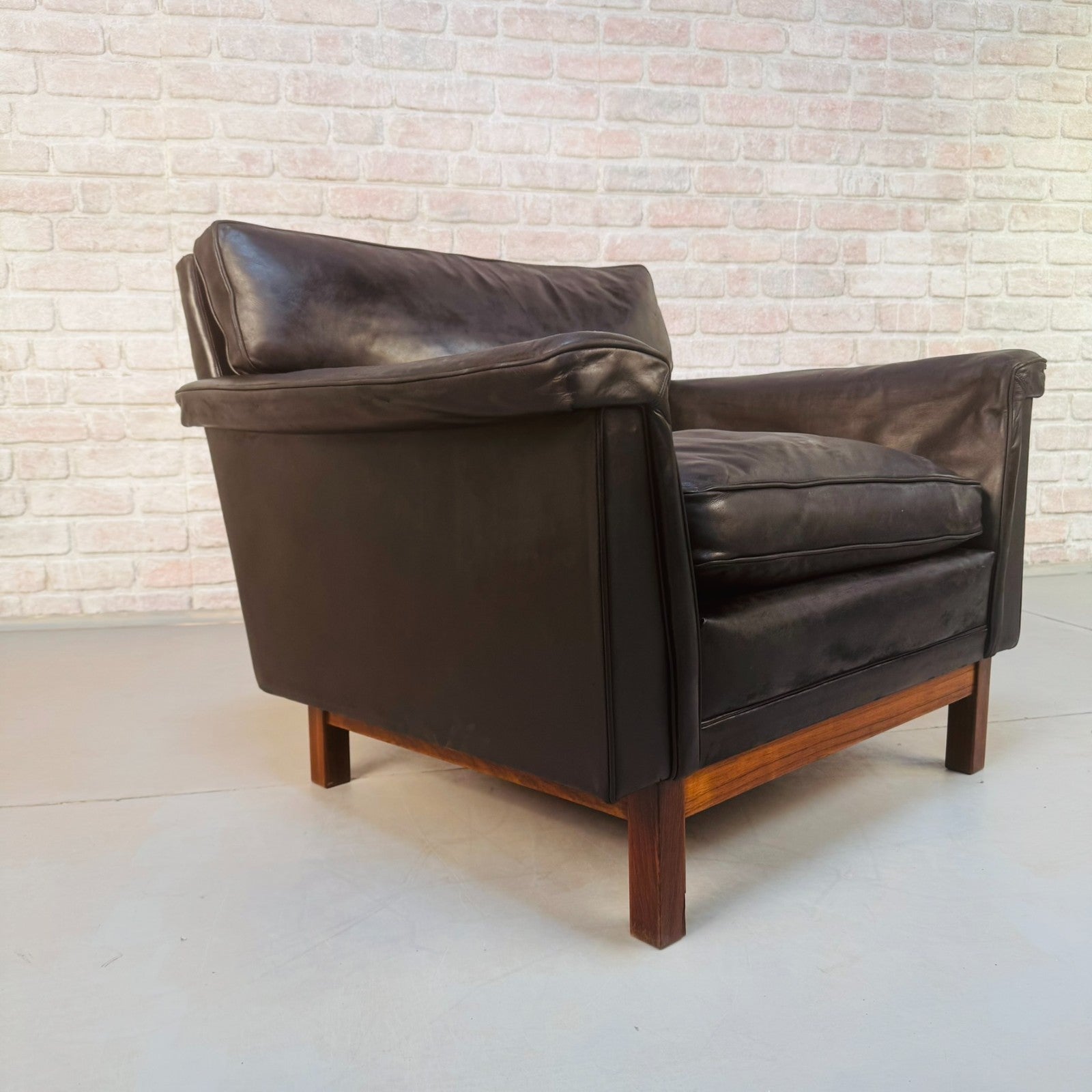 Vintage 1960s Swedish Black Leather Armchair – Rosewood Base