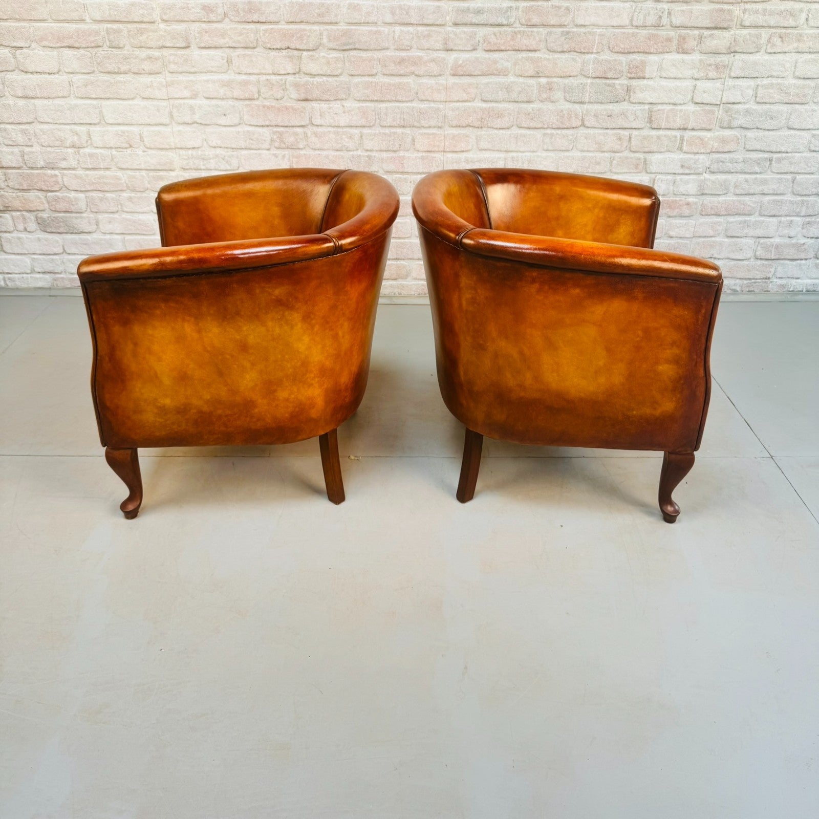 Vintage Pair of Danish Light Tan Leather Tub Chairs