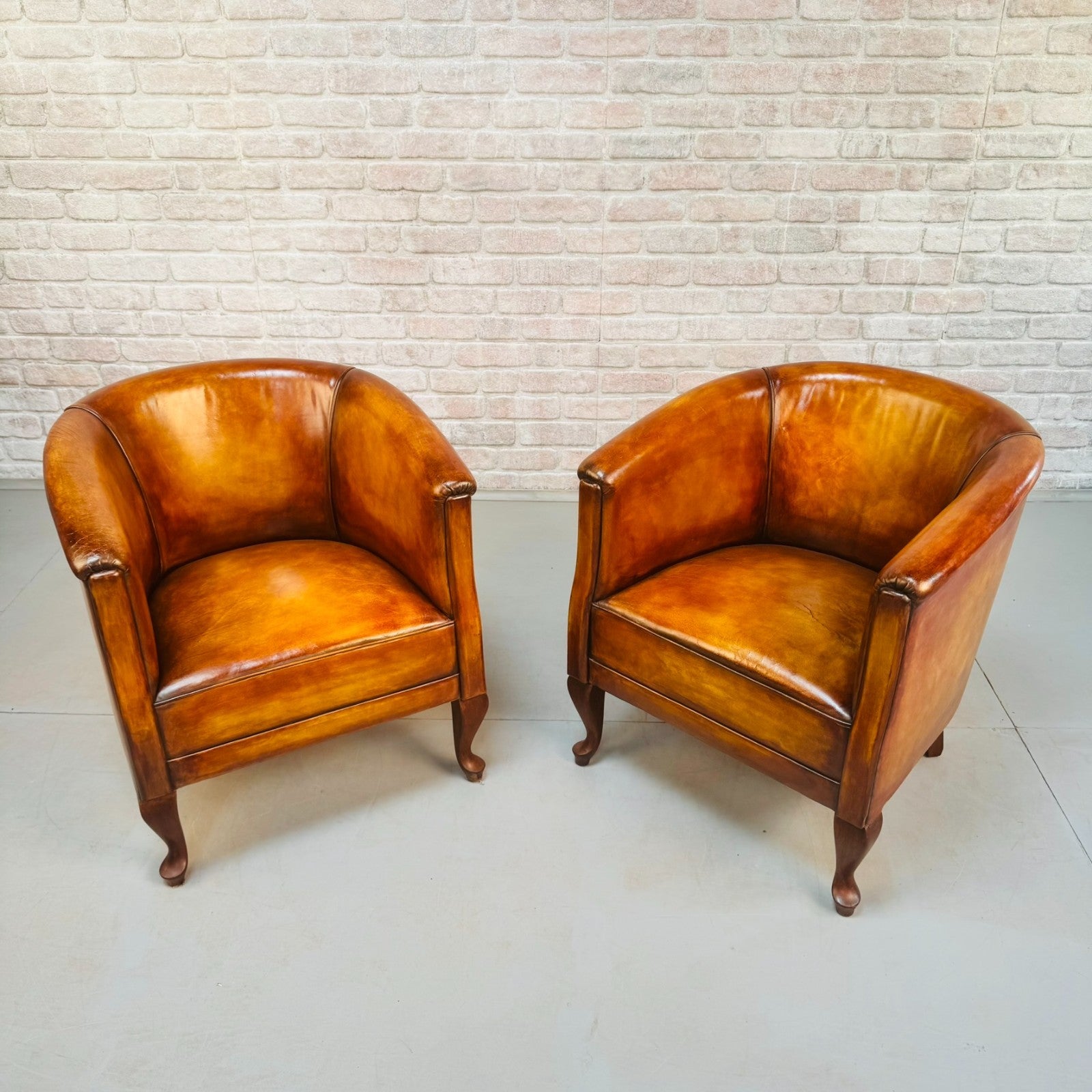 Vintage Pair of Danish Light Tan Leather Tub Chairs