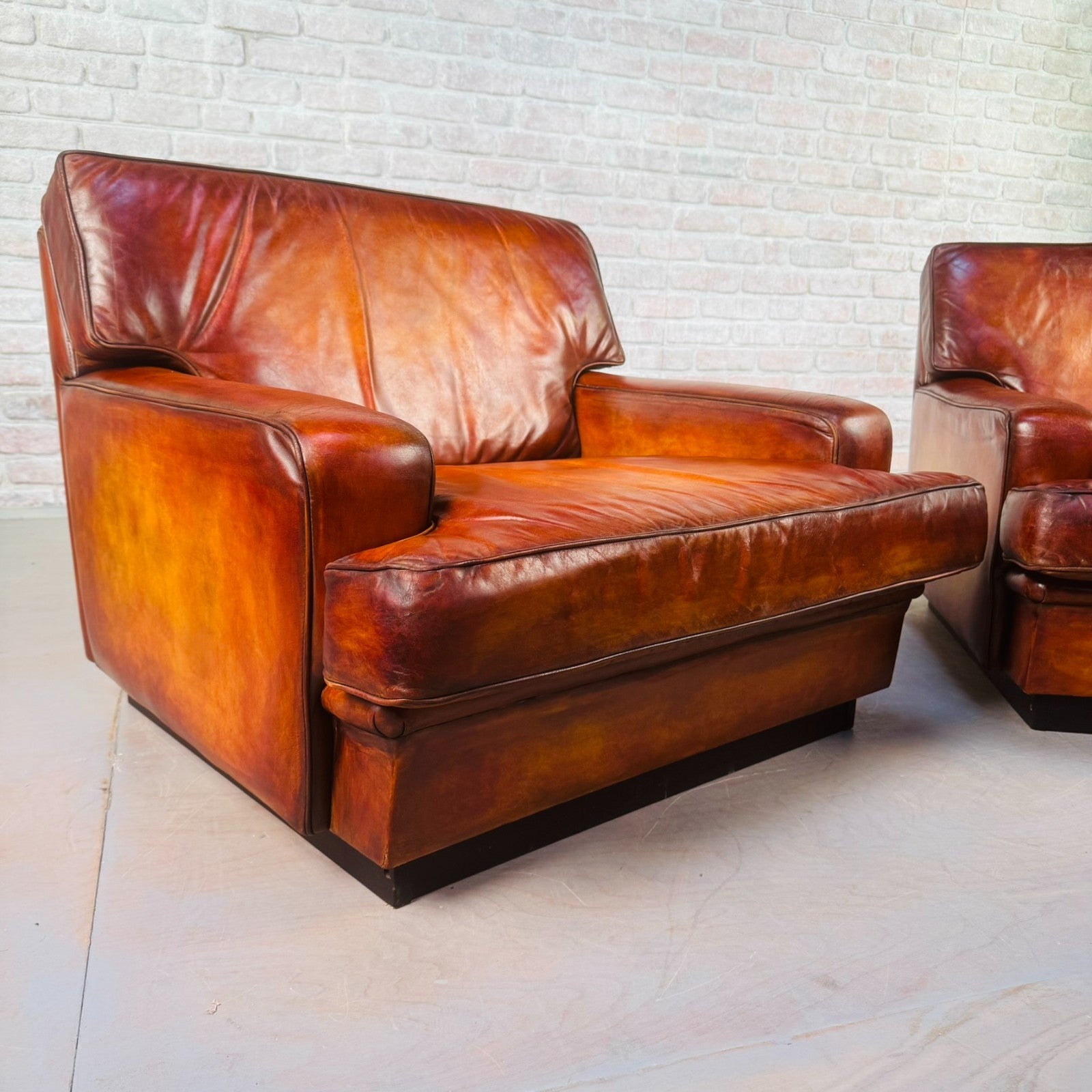 Pair of Arne Norell Swedish Tan Leather Lounge Chairs