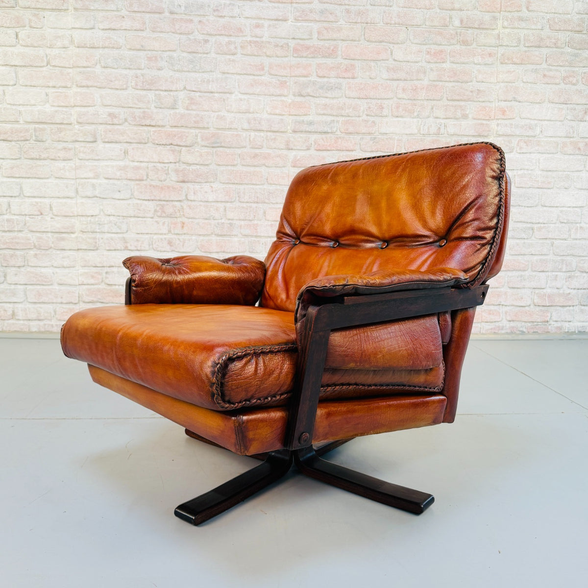 Vintage 1970s Arne Norell Swedish Tan Leather Swivel Chair & Footstool