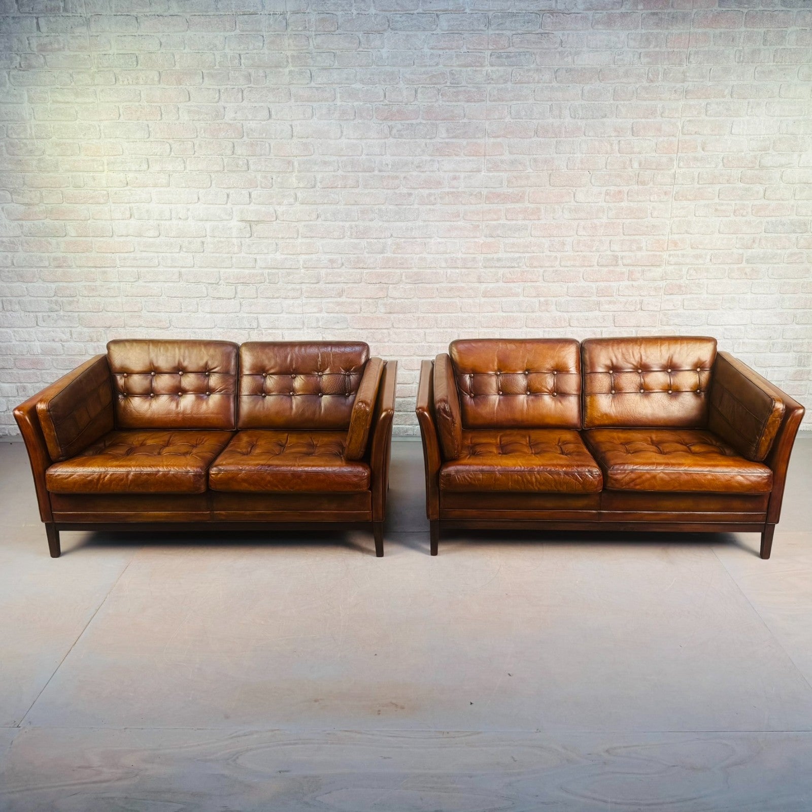 Pair of Vintage Danish Tan Leather Two Seater Sofas