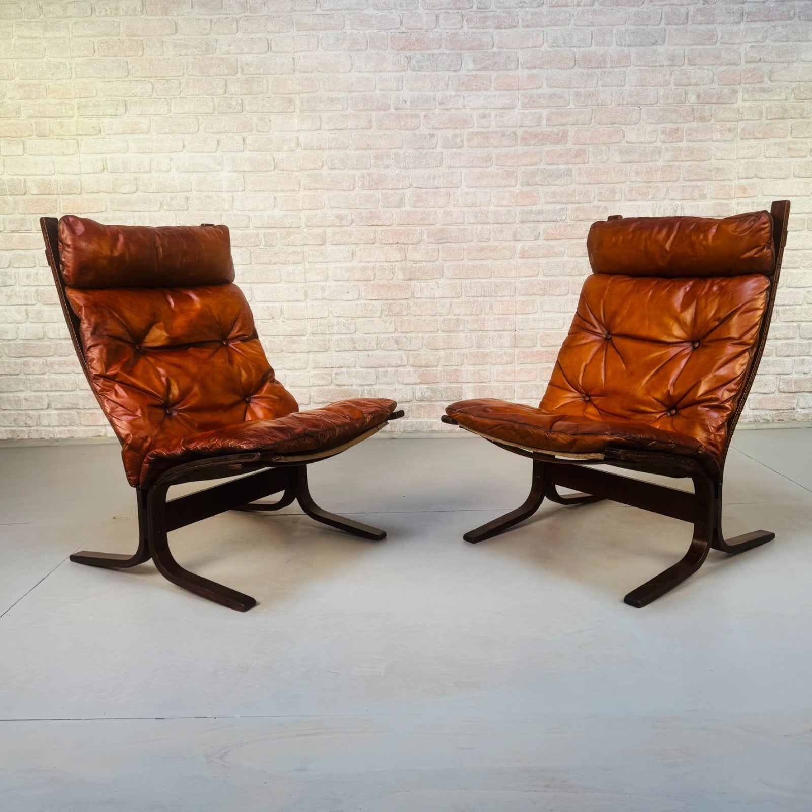 Pair of 1970s Westnofa Siesta High Back Lounge Chairs by Ingmar Relling