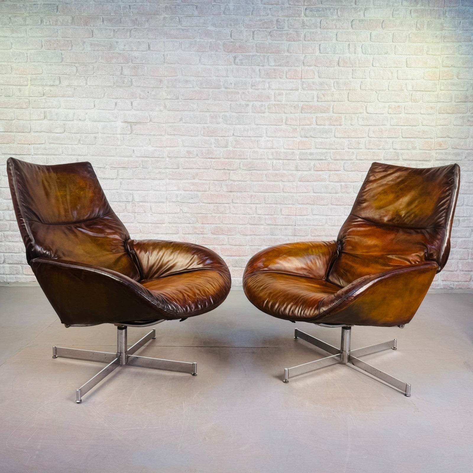 Stylish Vintage Danish Tan Leather Swivel Reclining Armchairs – Beautiful Patina