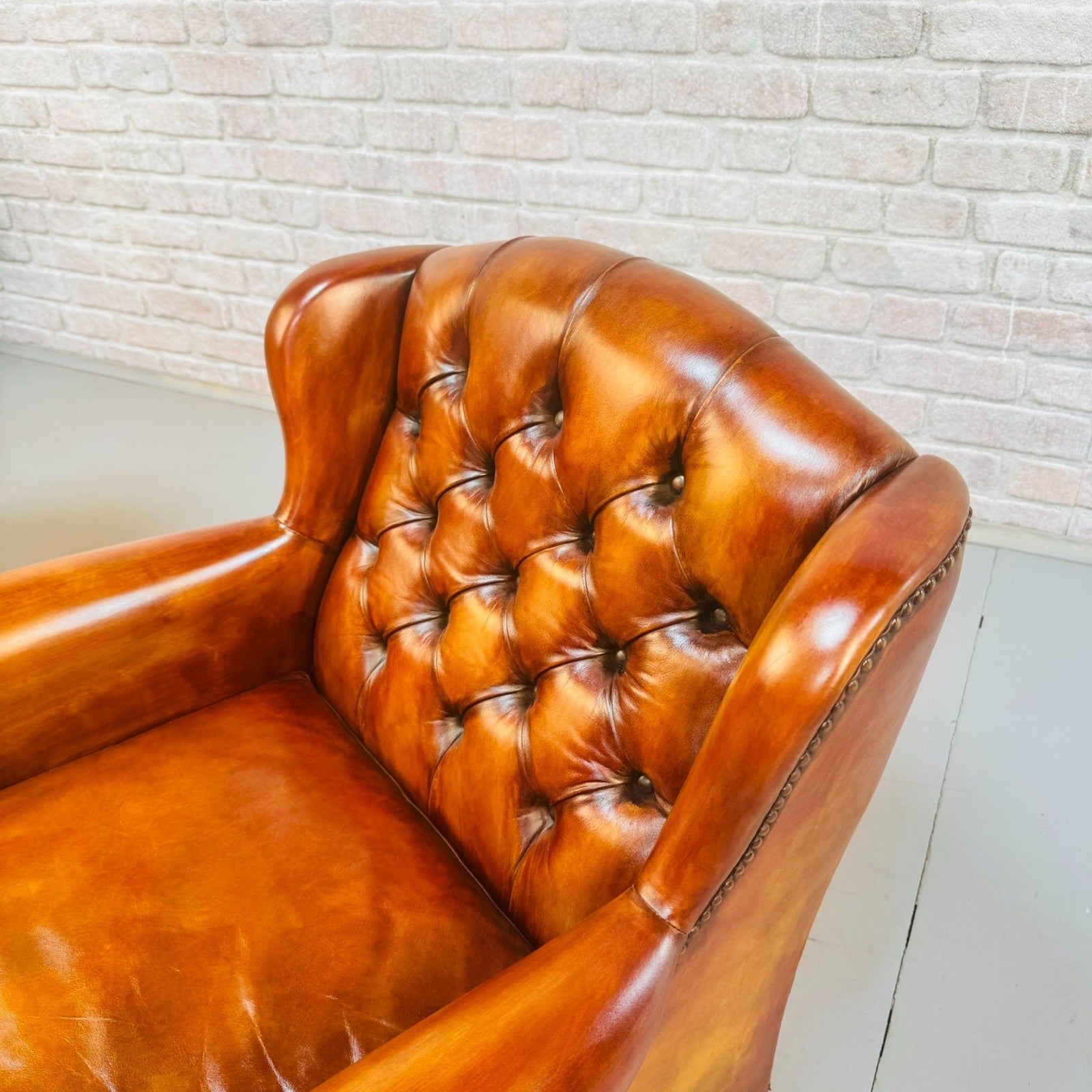 Vintage Pair of Danish Tan Leather Wingback Chairs