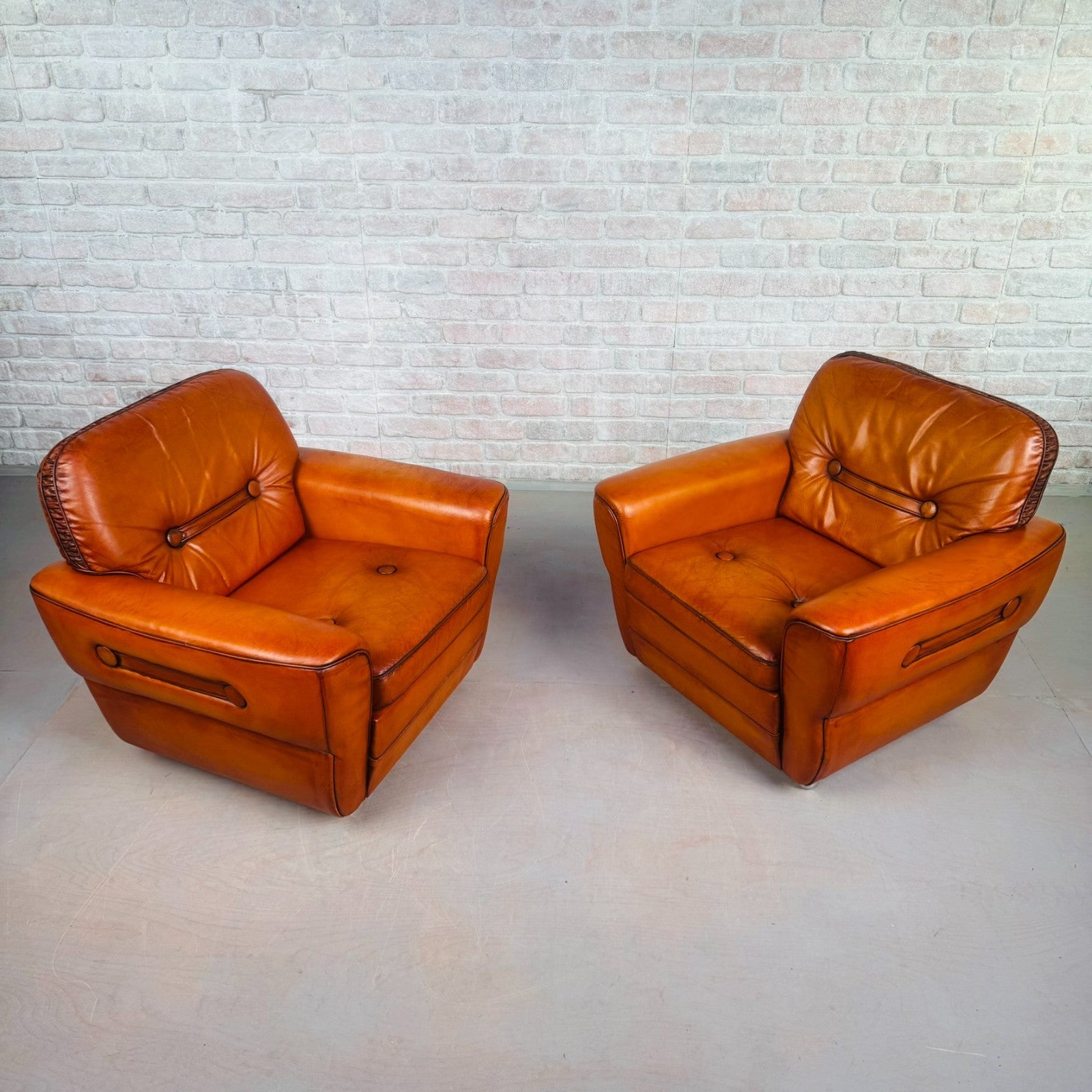 Pair of Elegant Danish Tan Leather Lounge Chairs