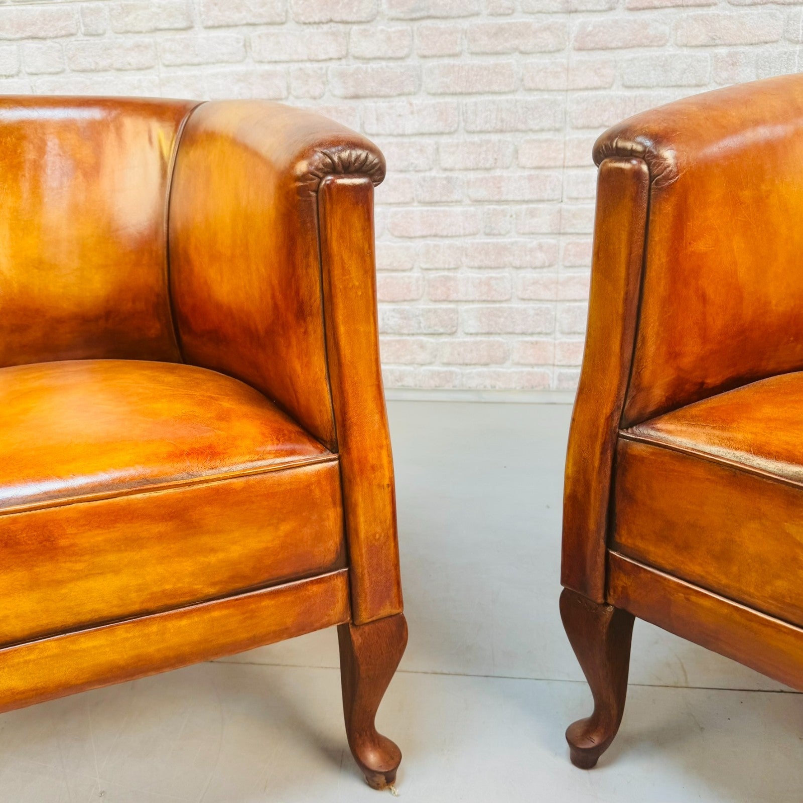 Vintage Pair of Danish Light Tan Leather Tub Chairs