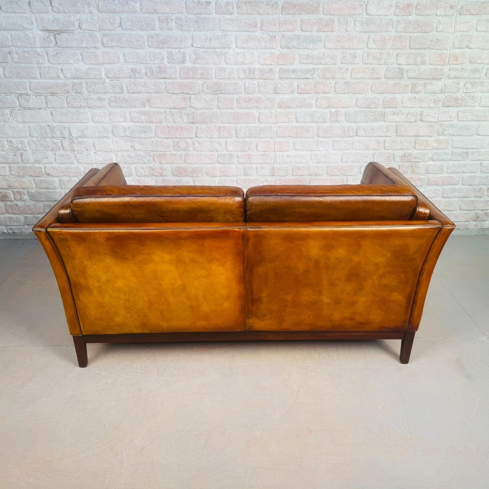Pair of Vintage Danish Tan Leather Two Seater Sofas