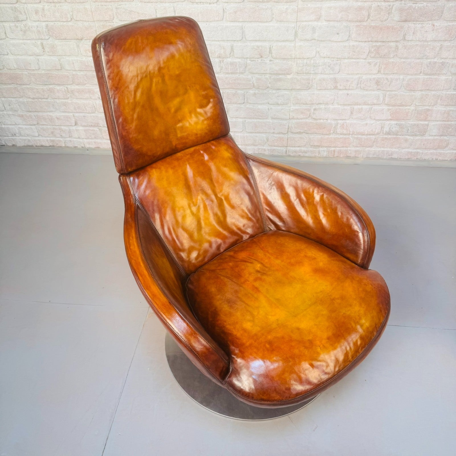 Pair of Vintage Italian Swivel Tan Leather Chairs