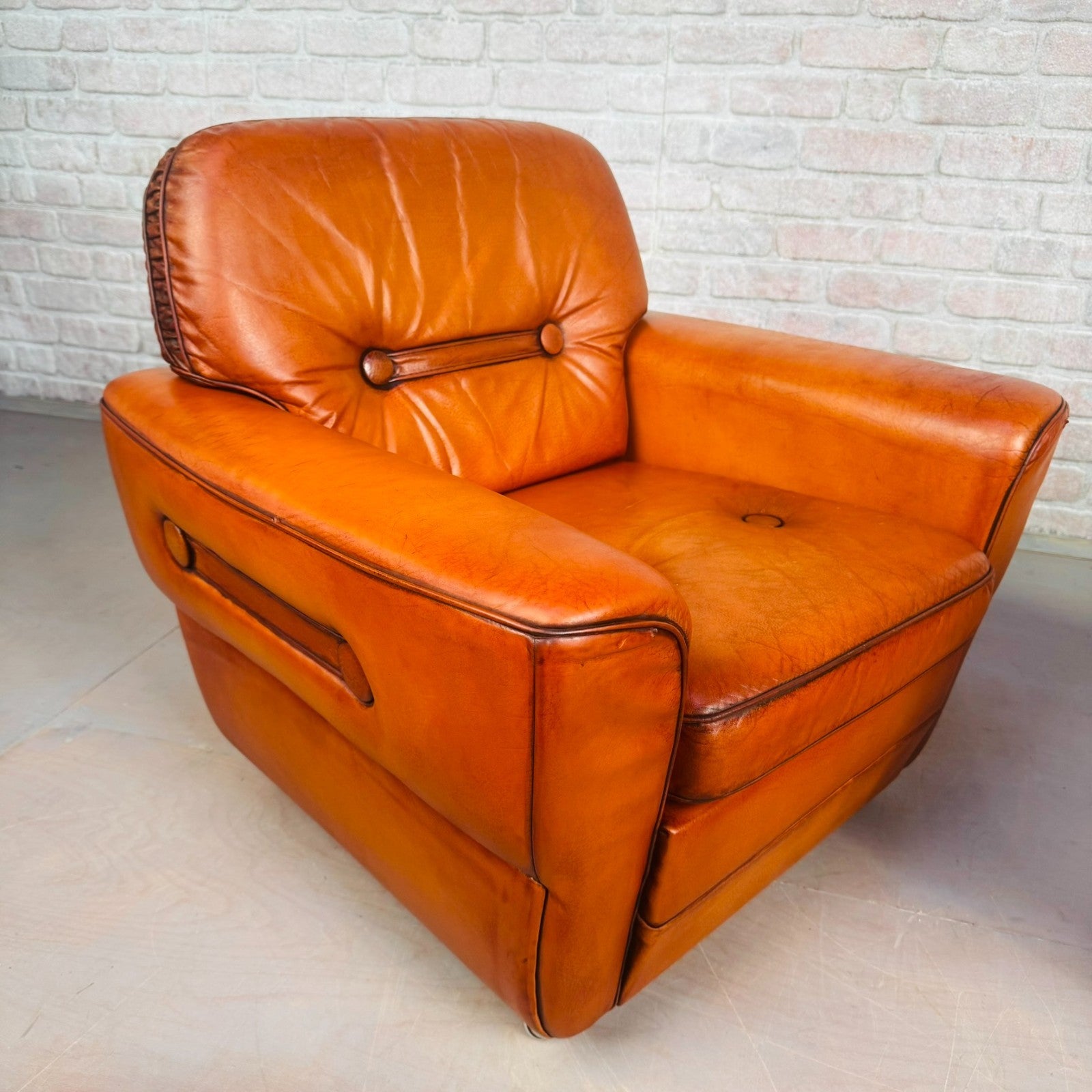 Pair of Elegant Danish Tan Leather Lounge Chairs