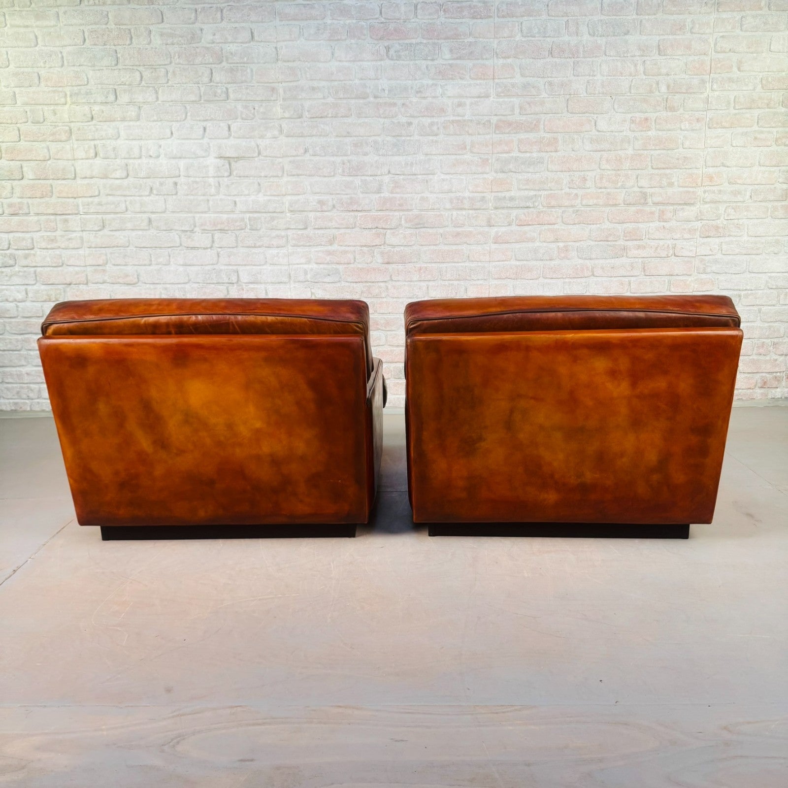 Pair of Arne Norell Swedish Tan Leather Lounge Chairs