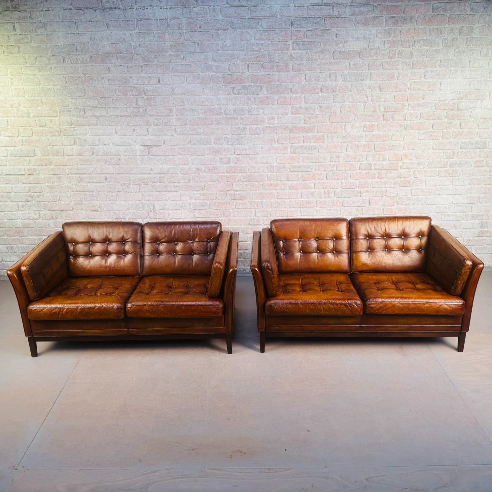 Pair of Vintage Danish Tan Leather Two Seater Sofas