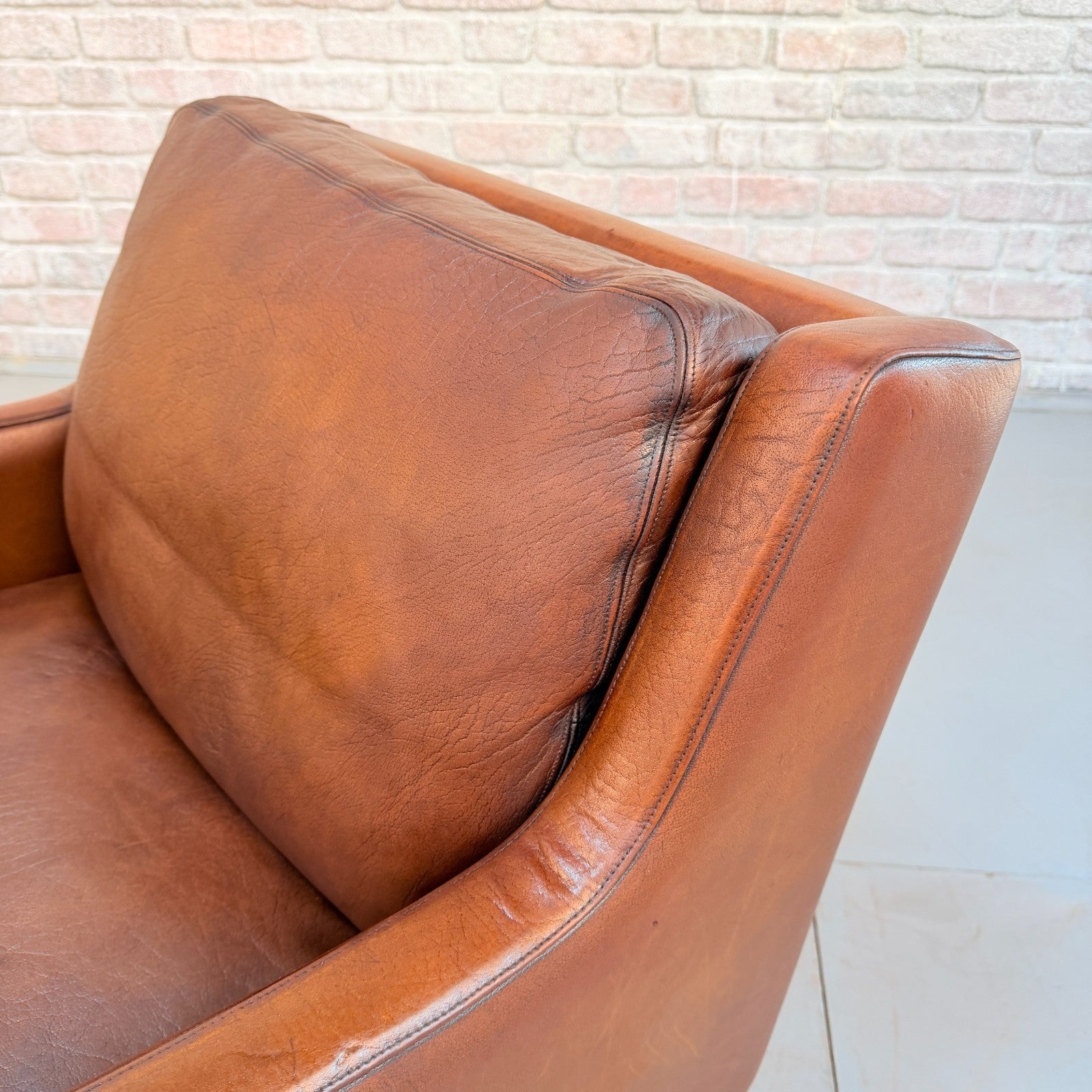 Vintage Near Pair Danish Tan Leather Armchairs Hand Dyed Feather Cushions