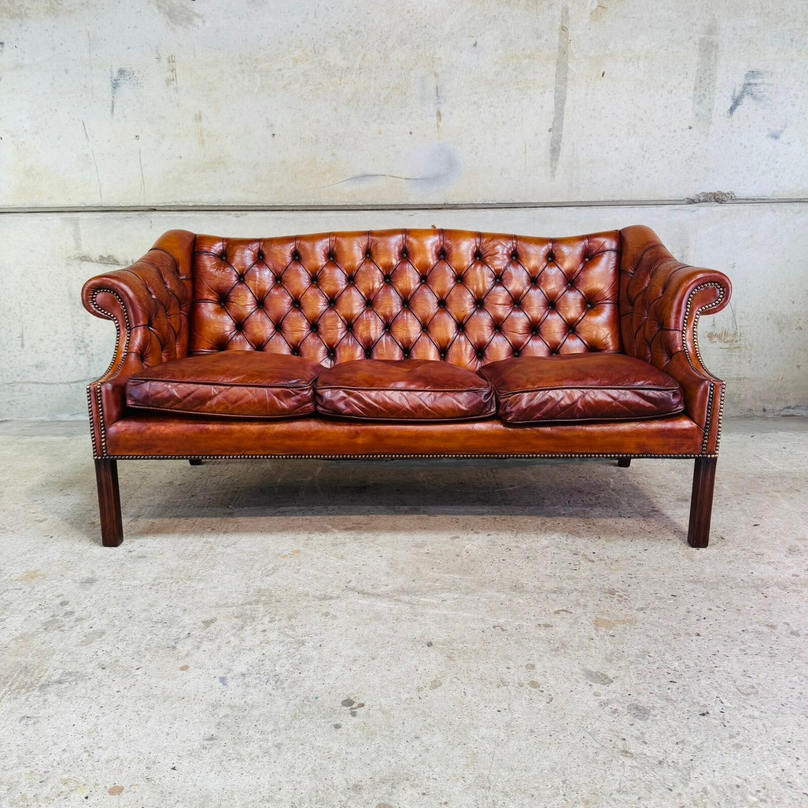 Mid-Century English Gainsborough Cognac Leather Chesterfield Three-Seater Sofa