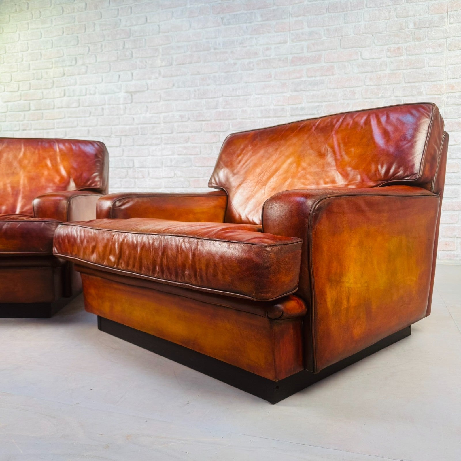 Pair of Arne Norell Swedish Tan Leather Lounge Chairs