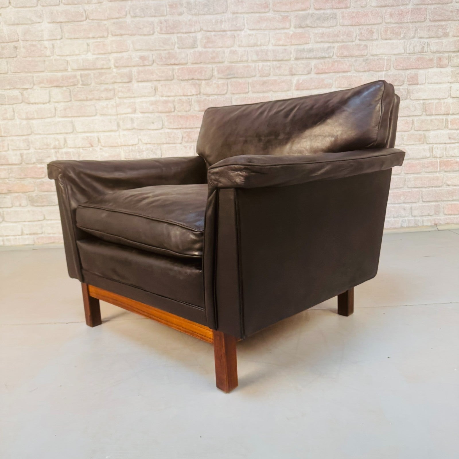 Vintage 1960s Swedish Black Leather Armchair – Rosewood Base