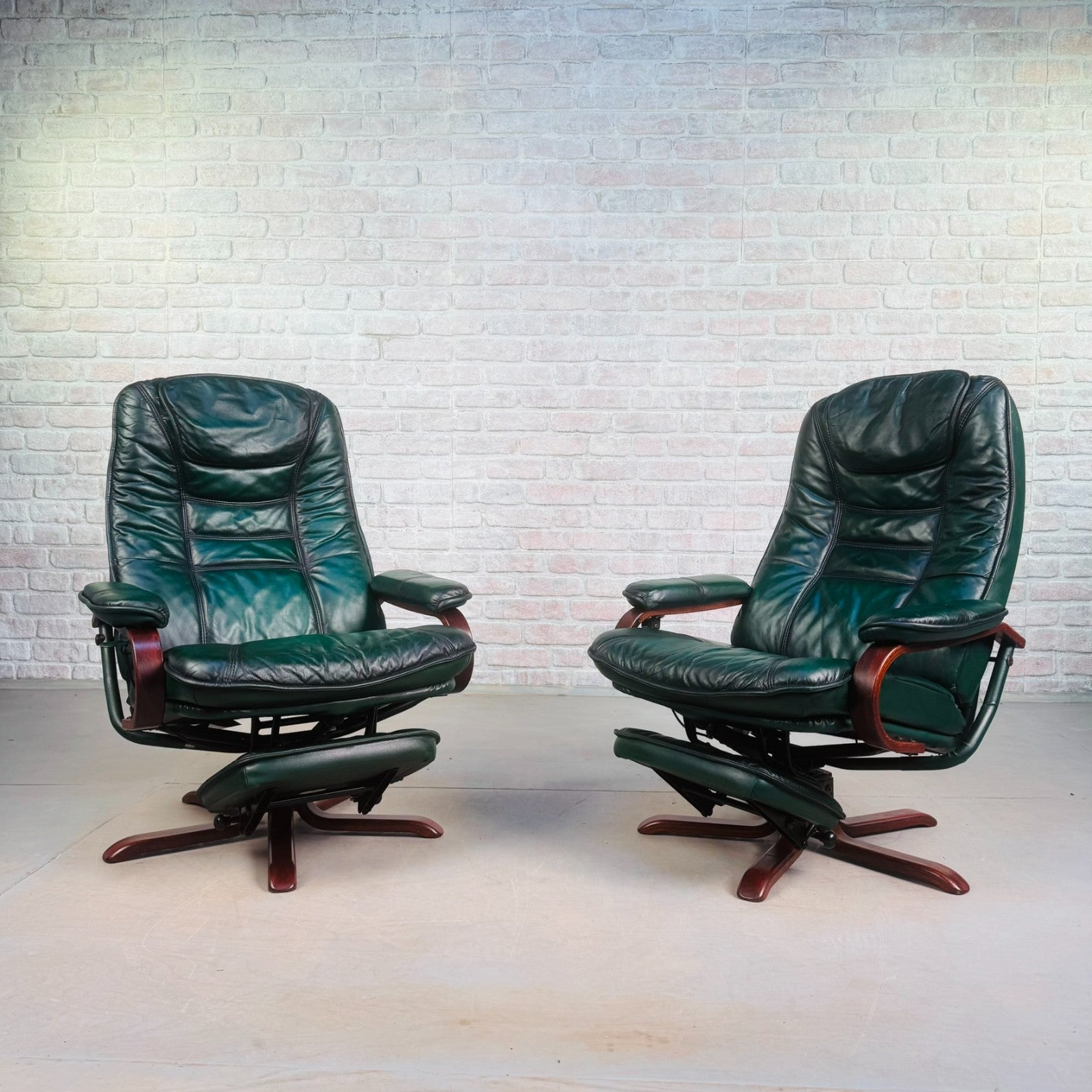 Vintage Pair of Norwegian Green Leather Reclining Swivel Chairs with Footstools