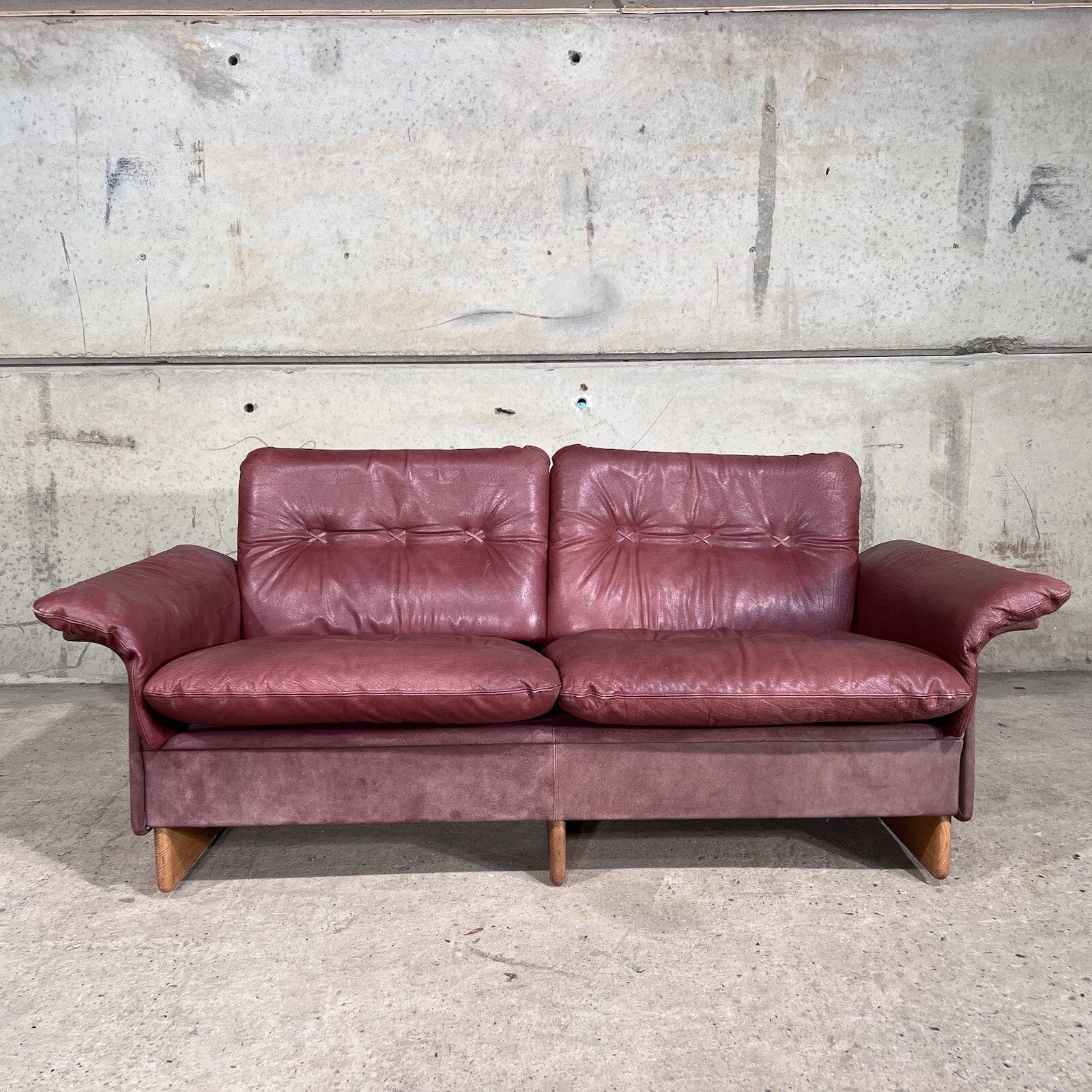 A Superb 1970s De Sede two-seater Mauve leather sofa