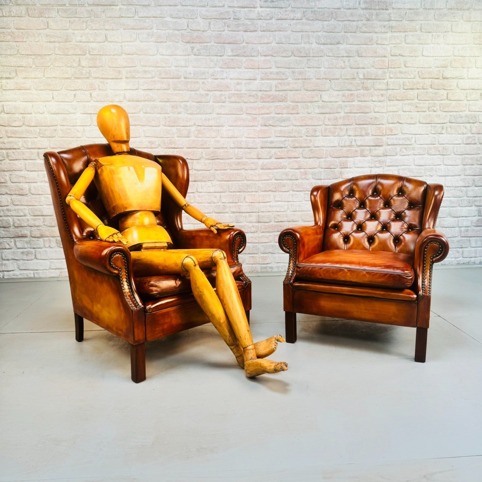 Vintage Pair of Danish Tan Leather Wingback Chairs