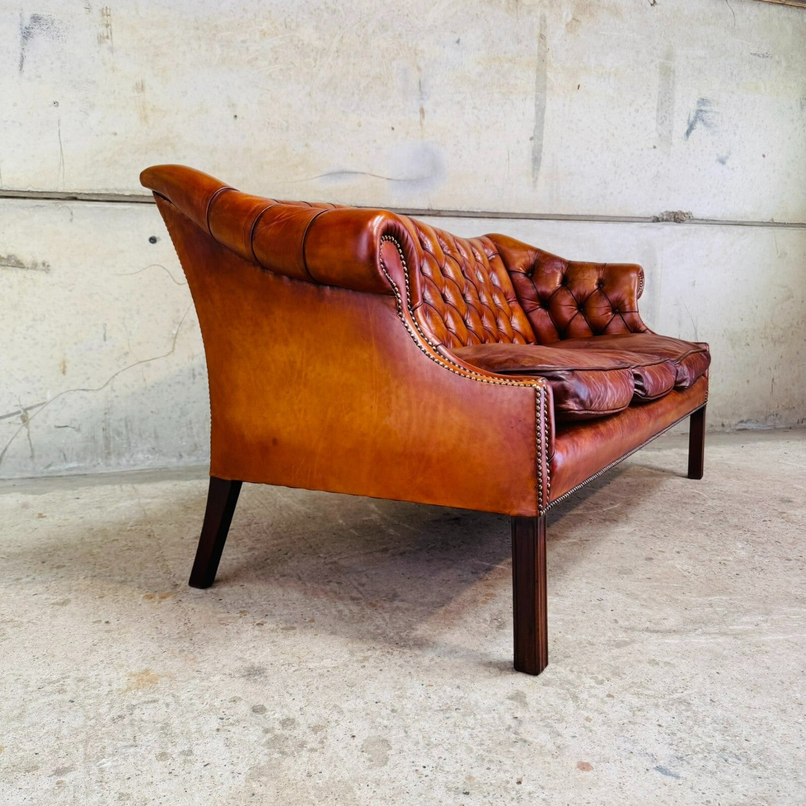 Mid-Century English Gainsborough Cognac Leather Chesterfield Three-Seater Sofa