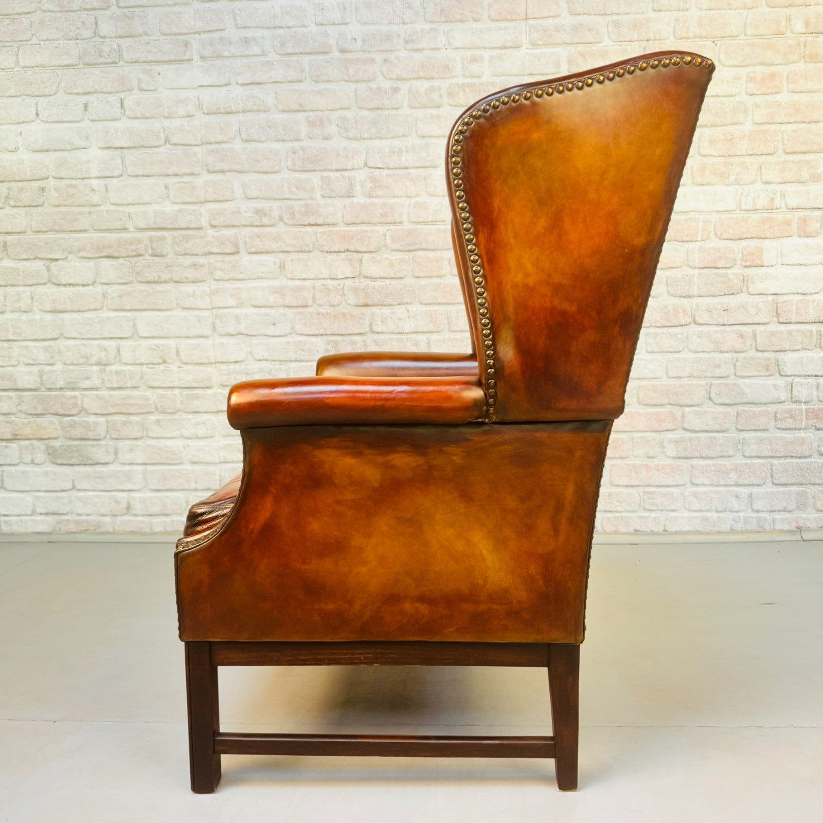 Neat Vintage Danish Leather Wingback Chair – Hand-Dyed Tan Colour