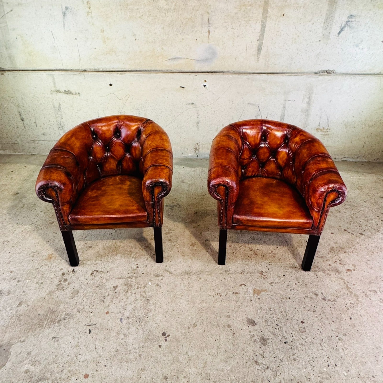 Pair of Elegant English Made Vintage Chesterfield Tan Leather Tub Chairs
