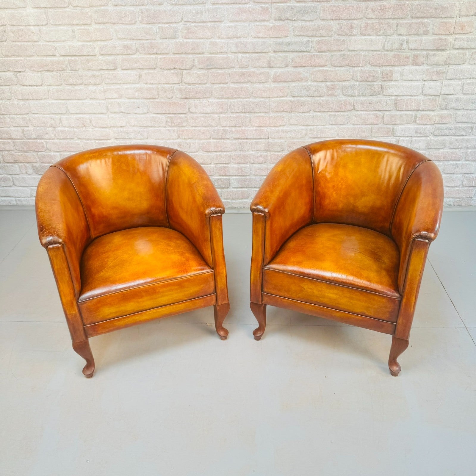 Vintage Pair of Danish Light Tan Leather Tub Chairs