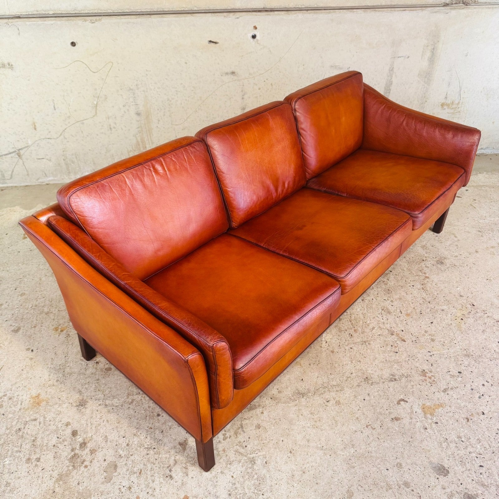 1970s Danish Cognac Leather 3 Seater Sofa — Curved Arms & Beech Plinth
